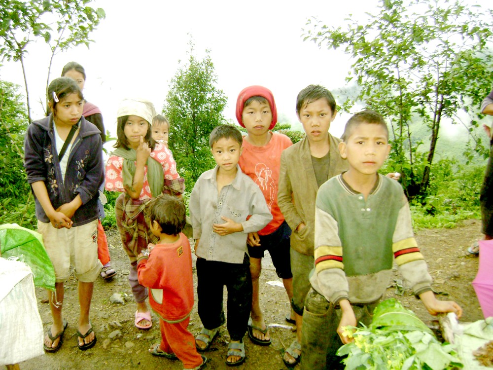 A group of children selling vegetables along the Tuensang highway. (Morung Photo)